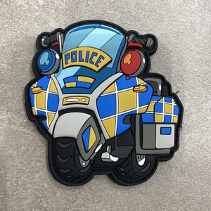 May include: A blue and yellow chequered police motorcycle patch with the word "POLICE" in white letters on the front.