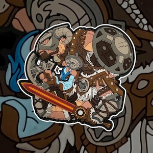 May include: A sticker depicting a cartoon Viking warrior in brown and tan armour, holding a red and yellow sword and a shield. The warrior wears a horned helmet and has a long beard. The sticker has a white border.