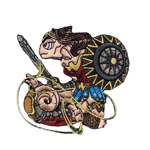 May include: Embroidered patch depicting a stylized Wonder Woman. The patch features the character with a shield, sword, and lasso, in shades of brown, red, blue, and gold. The design is set against a white background.