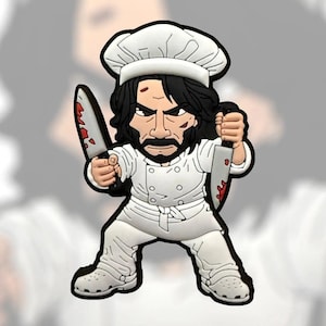 May include: A white chef-themed charm with a black outline. The chef has black hair, a mustache, and a goatee, wearing a chef's hat and uniform. He holds two knives with red blood-like marks.