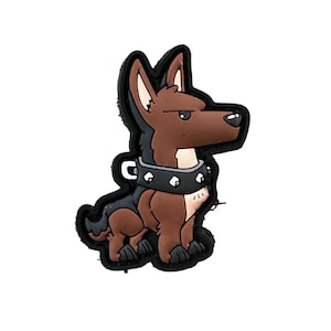 May include: A cartoon-style patch featuring a brown and black dog with a stern expression. The dog wears a black studded collar. The patch has a black border and is set against a white background. The dog is in a sitting position.