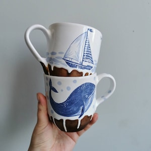 Mug with hand painting whale and ship for romantic people loving adventure. Nice gift for friends by Osokaart ceramics