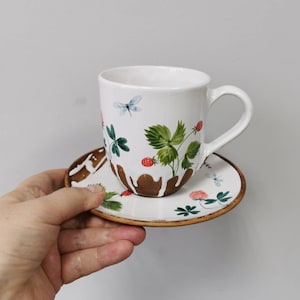 Ceramic mug with saucer by Osokaart for you or as a nice gift