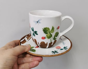 Ceramic mug with saucer by Osokaart for you or as a nice gift