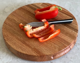 Round hardwood chopping block/ cutting board