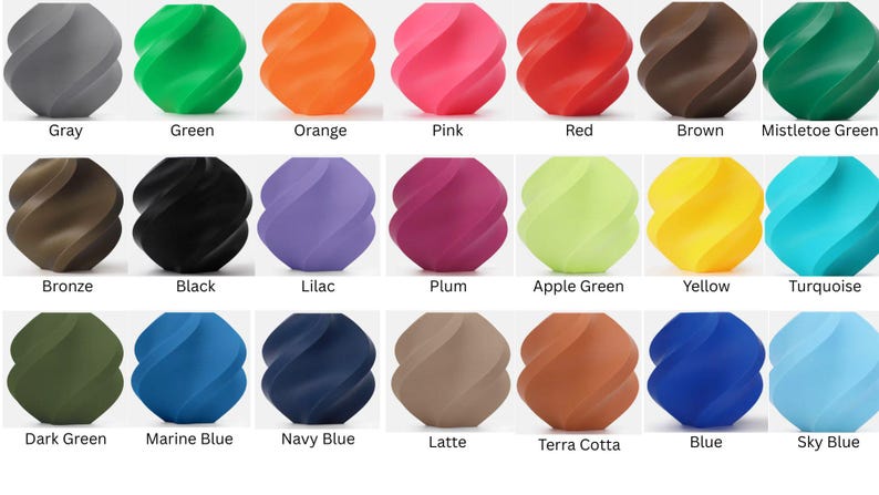 May include: A collection of twenty-one decorative, swirled spheres in various colors, including gray, green, orange, pink, red, brown, and mistletoe green. Additional colors are bronze, black, lilac, plum, apple green, yellow, turquoise, dark green, marine blue, navy blue, latte, terra cotta, blue, and sky blue.
