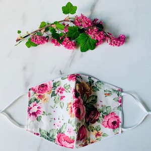 Reusable 100% cotton face mask in pink and cream roses floral print, light and breathable double layer design, adjustable ear straps