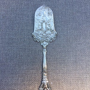 Ornate Silver Server, 800 silver mark, Pierced Repousse,Barogue Style, Cherub on handle, German or Italian