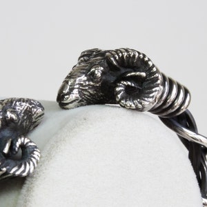 Ancient Strength: Men&#39;s Heavy Silver Ram Head Bangle