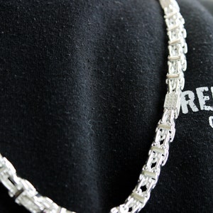 9-MM Bling Masterpieces: Silver Magnum Chain, Koningsketting Chain and Iced Out Hip Hop Chains Collection