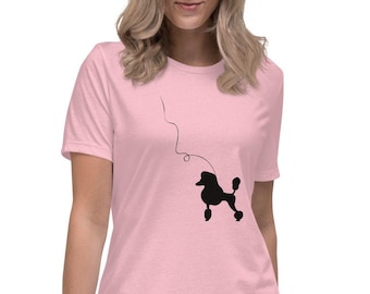 May include: A pink women's t-shirt with a black silhouette of a poodle on a leash.