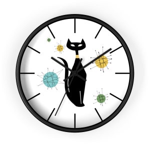 May include: A black and white clock with a black cat silhouette and colorful mid-century modern style starbursts. The clock has black hands and a black frame.