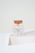 Empty jars (candies, sugared almonds) with ribbon and personalized transparent label for baptism, communion or profession of faith product logo