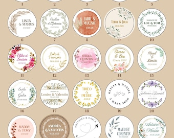 May include: A collection of 30 round stickers with names and dates, perfect for weddings or special events. Each sticker features a unique design, including floral arrangements, geometric shapes, and elegant fonts. The stickers are white with various colors.