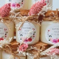 Personalized candle gifts for guests, birthdays, baptisms, weddings, with dried flowers product logo
