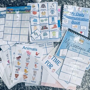 Kerstcadeau 300 pec blauw bundel foto's kaart communicatie zin reisboek potje grafiek Logopedie Autisme non-verbaal