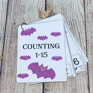 Pipistrelli viola conteggio centro attività matematica lavoro di routine numeri da 1 a 15 flash card ritorno a scuola