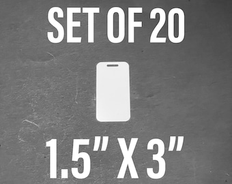 May include: Set of 20 blank white rectangular tags, each measuring 1.5 inches by 3 inches. The tags have a hole at the top for hanging.