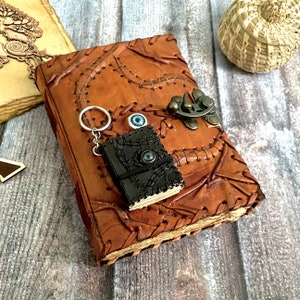 The vintage leather journal is a perfect sketchbook, drawing journal, great gift for man & women, wicca journal, story journal, scrapbook, art journal, travel journal, grimoire journal.