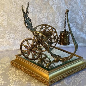 Vintage Brass Wine Bottle Holder Chariot Style With Turning Wheels Very Ornate And Detailed Colourful Complete With Attached Cork Decor