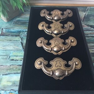 A Vintage Set Of 4 Brass Batwing Drawer Pulls In Great Vintage Condition Ready to Be Installed On Your Next Project