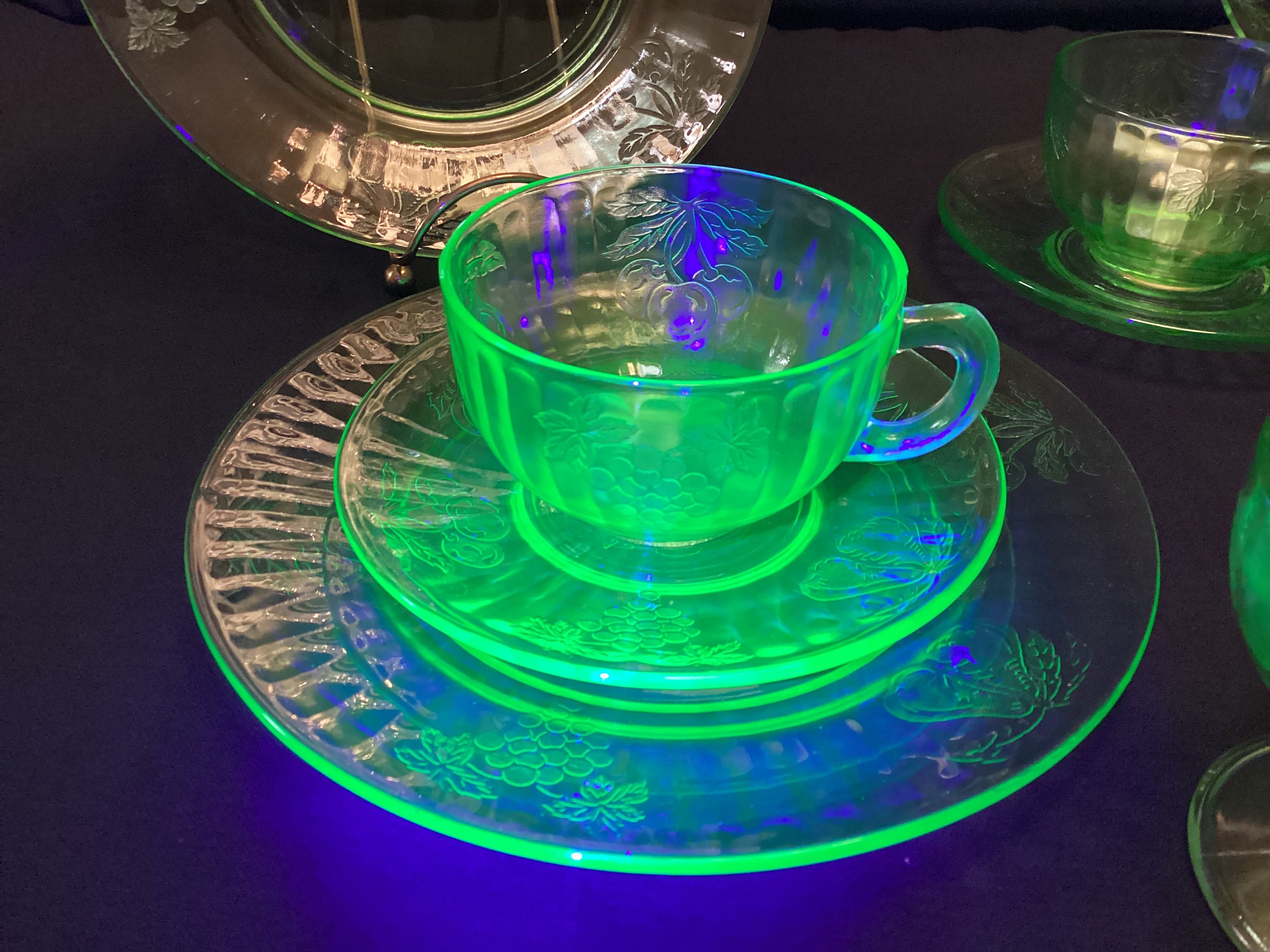 Uranium Glass Large Collection Of Plates Saucers Cups One Sherbet Cup Left With A Flea Bite Chip Great Glow To all Pieces