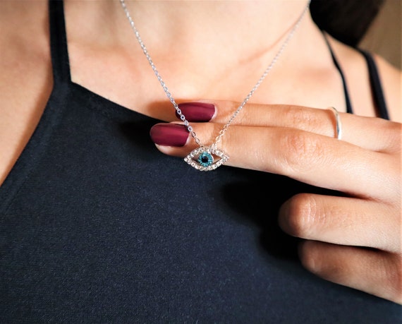 Small evil shop eye pendant