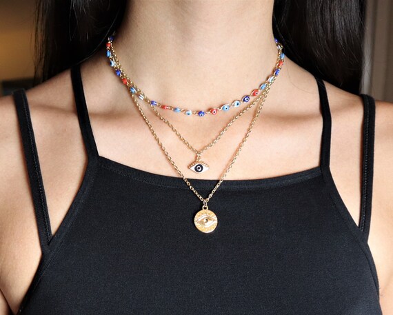Multiple evil eye necklace deals