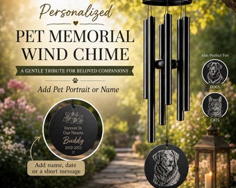 May include: A black metal wind chime featuring multiple cylindrical tubes and a circular pendant engraved with a dog portrait. The text on the product includes Personalized Pet Memorial Wind Chime, Forever in Our Hearts, Buddy, and 2012-2023.