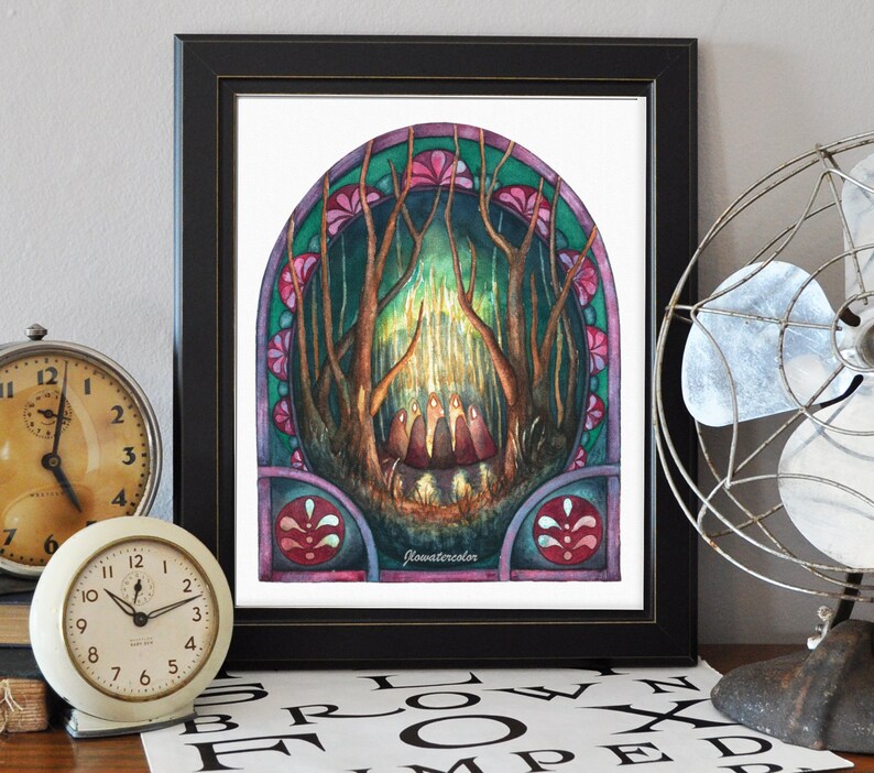 May include: A watercolor painting of a forest scene with a glowing light in the center. The painting is framed in a black frame and has a stained glass effect. The text "Watercolor" is written in the bottom right corner.