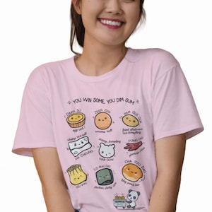 May include: A pink t-shirt with a graphic of different types of dim sum, with the text "You win some, you dim sum".