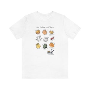 May include: White t-shirt with a graphic design of various dim sum dishes and a panda holding a takeout box. The text on the shirt reads "You win some you dim sum".
