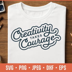 May include: A white t-shirt with a blue graphic that says "Creativity Takes Courage".