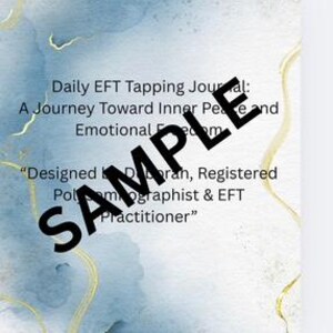 May include: A journal with a blue and gold watercolour design. The text on the cover reads "Daily EFT Tapping Journal: A Journey Toward Inner Peace and Emotional Freedom." The journal is designed by a registered Polysomnographist and EFT Practitioner.