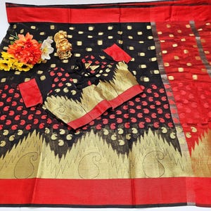 Women&#39;s Saree with Designer Blouse : Elegant Silk Cotton Saree, accompanied by an unstitched running blouse and a FREE designer blouse