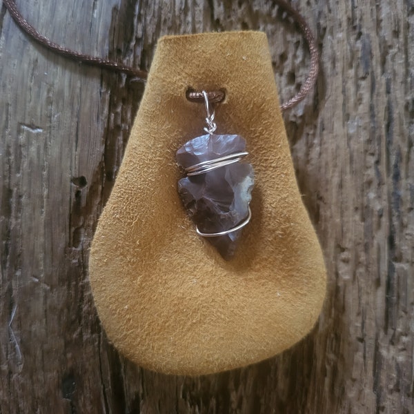 Stone Arrowhead On Elk Hide