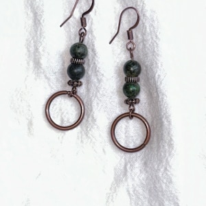 Boho Natural Turquoise Stacked bead Dangle Earrings. Antique Copper accents and metal circle dangle add an extra flair. Rustic, Minimalist.