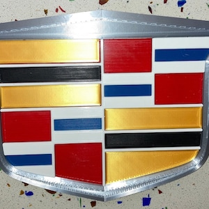Cadillac embossed wall sign