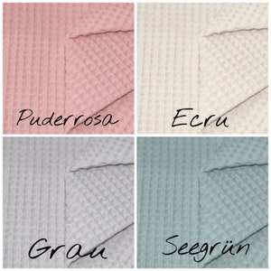 May include: Four fabric swatches in different colors: dusty rose, ecru, gray, and seafoam green. Each swatch has a waffle texture.