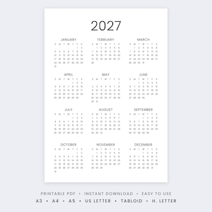 May include: A 2027 annual calendar printed in black ink on a white background. The layout features twelve months arranged in a grid, each displaying the days of the week and corresponding dates. Text at the bottom lists printable PDF, instant download, easy to use, A3, A4, A5, US Letter, Tabloid, and H. Letter.