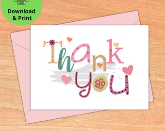 May include: Printable thank you card with a pink, green, and brown "Thank You" message with hearts and flowers. The card is A2 and A7 envelope size.