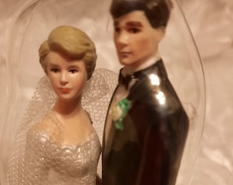 Wilton Wedding Cake Topper Bride short blonde hair Groom dark hair.