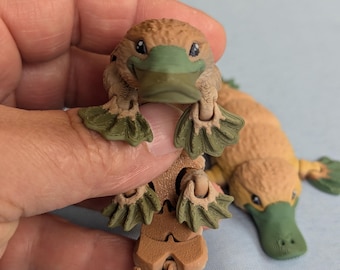 Juguete articulado de ornitorrinco: figura flexible y antiestrés, ideal como regalo para fiestas.
