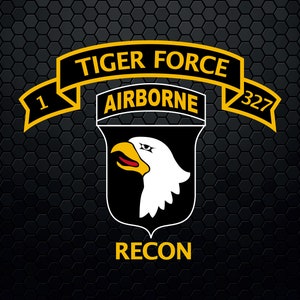 May include: A black and yellow military patch with a white eagle head and the text "Tiger Force Airborne 1 327 Recon".