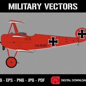 May include: A red Fokker Dr.I triplane with black iron crosses on the wings and tail. The plane is labeled "Fok.DR1477".