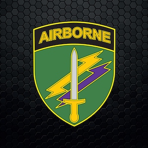 May include: A green and yellow shield with the word "AIRBORNE" in black letters. The shield features a silver sword with a yellow handle and three lightning bolts, two yellow and one purple.