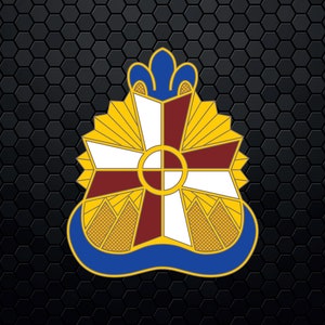 May include: A gold and blue military unit insignia with a white and maroon cross in the center. The cross is surrounded by a circle with a smaller circle in the center. The insignia is on a black background.