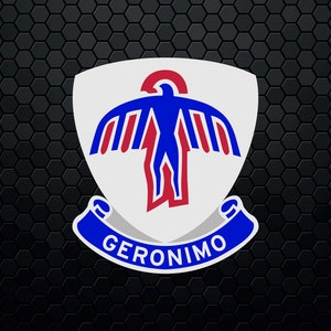 May include: A white shield with a blue and red stylized bird design. The shield has a blue ribbon with the word "GERONIMO" written in white.