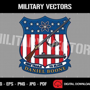 May include: A military vector graphic featuring a shield design with a rifle, submarine, and atomic symbol. The shield has red and white stripes, blue stars, and the text "NEW TRAILS TO BLAZE" and "DANIEL BOONE".