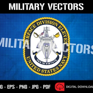 May include: A blue and gold emblem with a ship and crossed swords. The text reads "Surface Division Eleven United States Navy" and "Pax in Virtute".